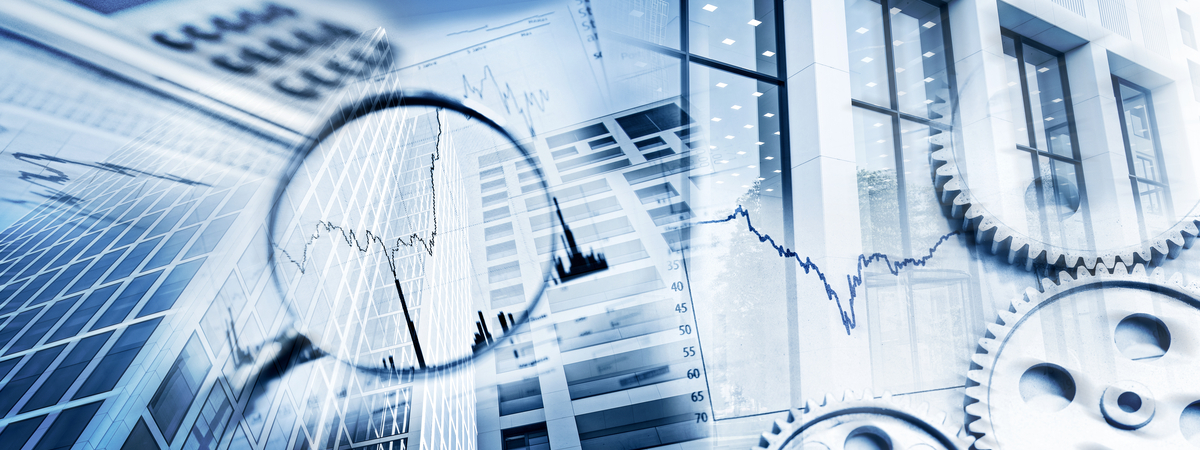 Magnifier, gears, charts, calculators and facades of office buildings as a symbol of business and financial markets.